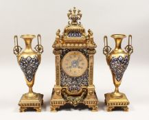 GOOD 19TH CENTURY FRENCH GILT METAL AND ENAMEL THREE PIECE CLOCK SET. The clock with blue enamel