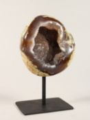 A GEODE on a metal stand