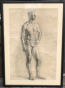 20th Century Russian School, A study of a standing male figure, charcoal, indistinctly signed, 26.5