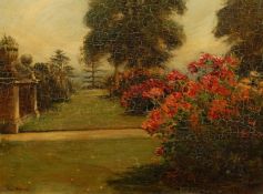 Tom Mostyn R.I (1864-1930) British, A garden scene with rose bushes, oil on board, signed, 10.25