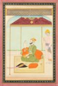Sikh School, a miniature painting of a Prince with a hawk and a servant in attendance, 12
