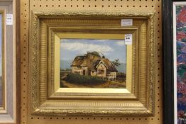 Thatched Farm House oil on canvas, in a decorative gilt frame.
