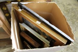 A quantity of picture frames.