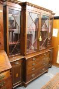 A good George III design inlaid mahogany break front library bookcase with dentil inlaid cornice,