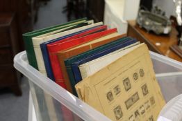 A quantity of albums and binders containing World and GB stamps, bank notes etc.