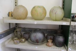 A large quantity of colourful opaque glass ceiling shades, bowls, jugs etc.