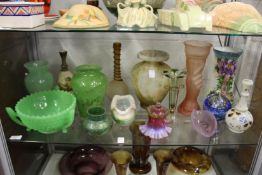 A good shelf of coloured glassware.