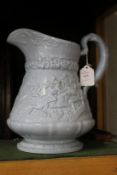 A large moulded pottery jug.