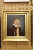 A study of a young boy with a ruff, oil on board in a gilt frame.