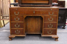 A good George III style mahogany kneehole pedestal desk.