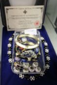 A decorative boxed necklace and other jewellery.