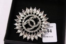 A decorative brooch.