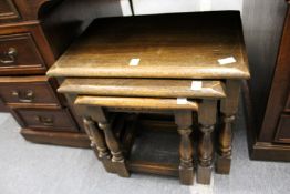 An oak nest of tables.
