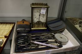 A hip flask, a carriage clock, drawing instruments etc.