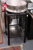 A Chinese hardwood two tier urn stand / table.