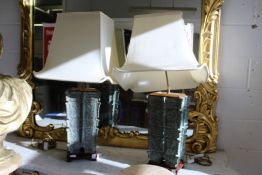 A good large pair of Chinese bronze archaic style lamps with shades.