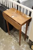A small drop leaf table.