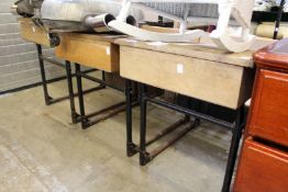 Three old school desks.