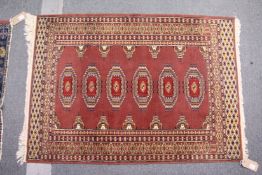 A small Persian style Bokhara rug.