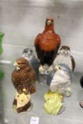 Various Beswick birds of prey decanters.