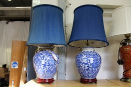 A good large pair of Chinese blue and white tables lamps.