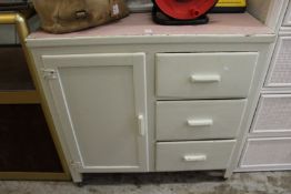 A painted kitchen cupboard.