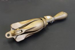 A small portable boat anchor.