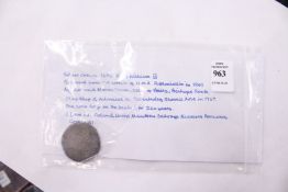 A William III silver crown, 1695, recovered from the wreck of HMS Association in 1967.