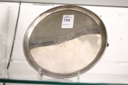 A George III circular silver waiter.