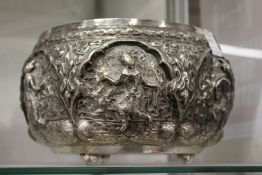 A good large Thai silver bowl with embossed decoration, 9ins diameter, 23ozs.