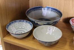 Three Chinese blue and white bowls.