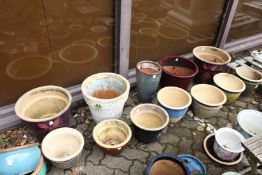 A group of large garden pots.