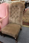 A button upholstered bedroom chair.