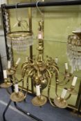 A good Dutch style brass twelve branch chandelier.