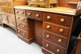 A Victorian mahogany kneehole desk.