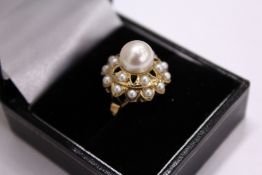 A 14ct gold and pearl dress ring.