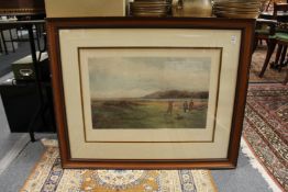 A pair of golfing prints 