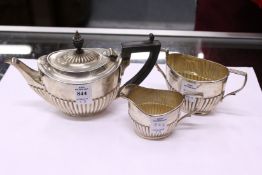 A small three-piece oval silver tea set comprising teapot, sugar basin and milk jug, 13ozs.
