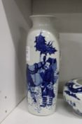 A Chinese blue and white decorated sleeve vase.