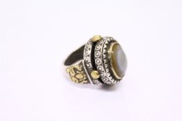 A large decorative Islamic dress ring.