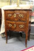 An 18th / 19th century French marble topped and kingwood two drawer petite commode.