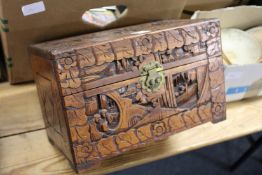 A Chinese carved wood box.