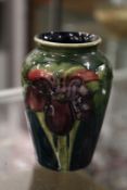 A small Moorcroft vase.