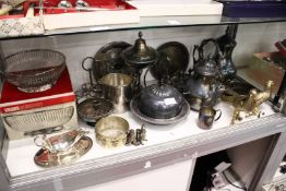 A quantity of plated ware to include a kettle on stand a coffee pot etc.