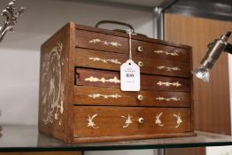 A cased Mahjong set.