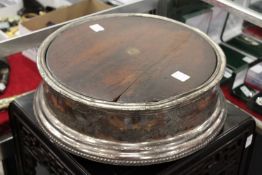 A large plated circular cake stand.