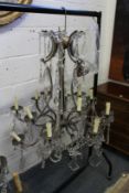 A good large wrought iron and cut glass Venetian style chandelier.