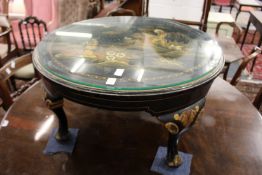 A chinoiserie decorated circular coffee table.