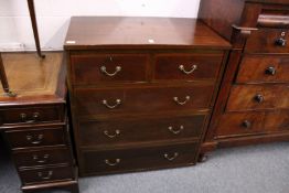 A mahogany chest of drawers.