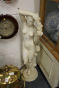 A large classical style standing female nude.